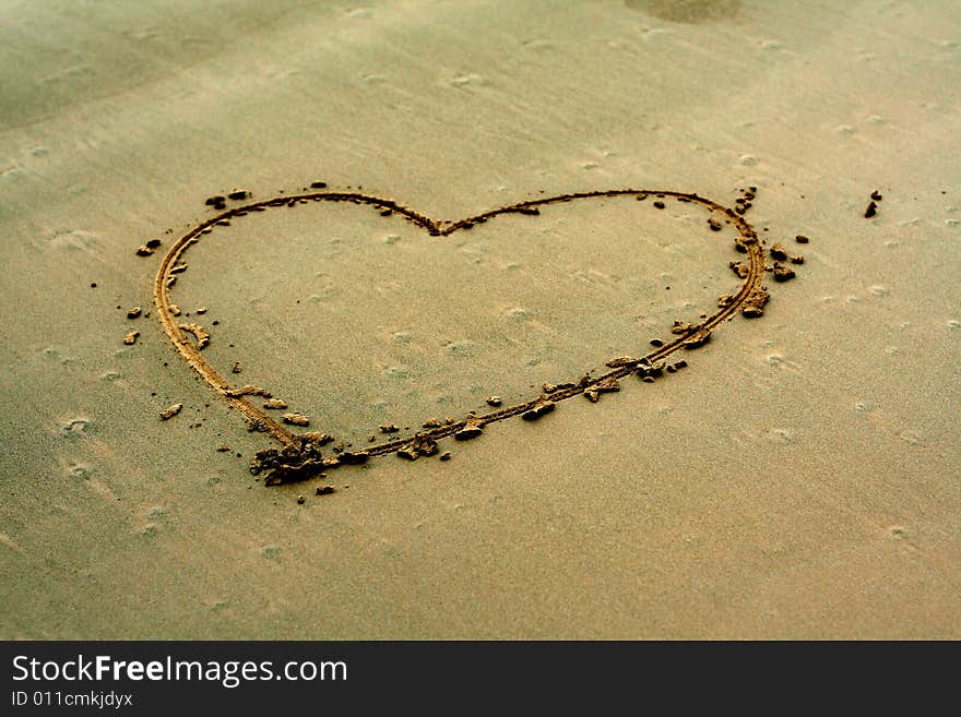 Heart shape on sand