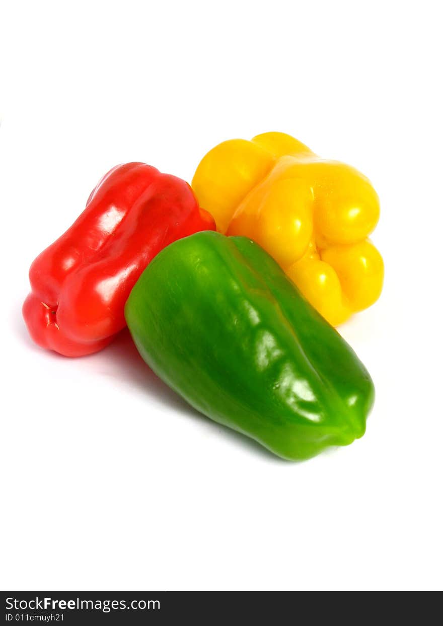 Three color peppers, on white background