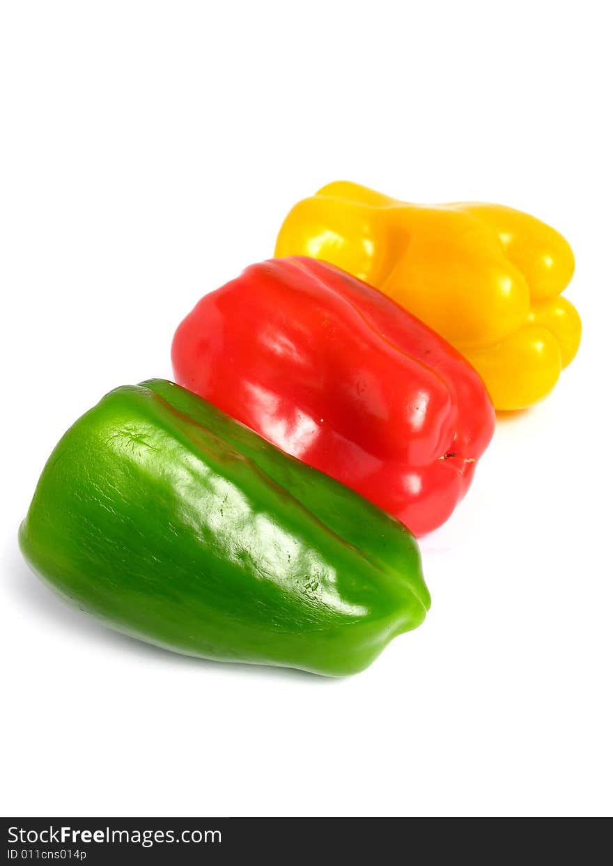 Three color peppers, on white background