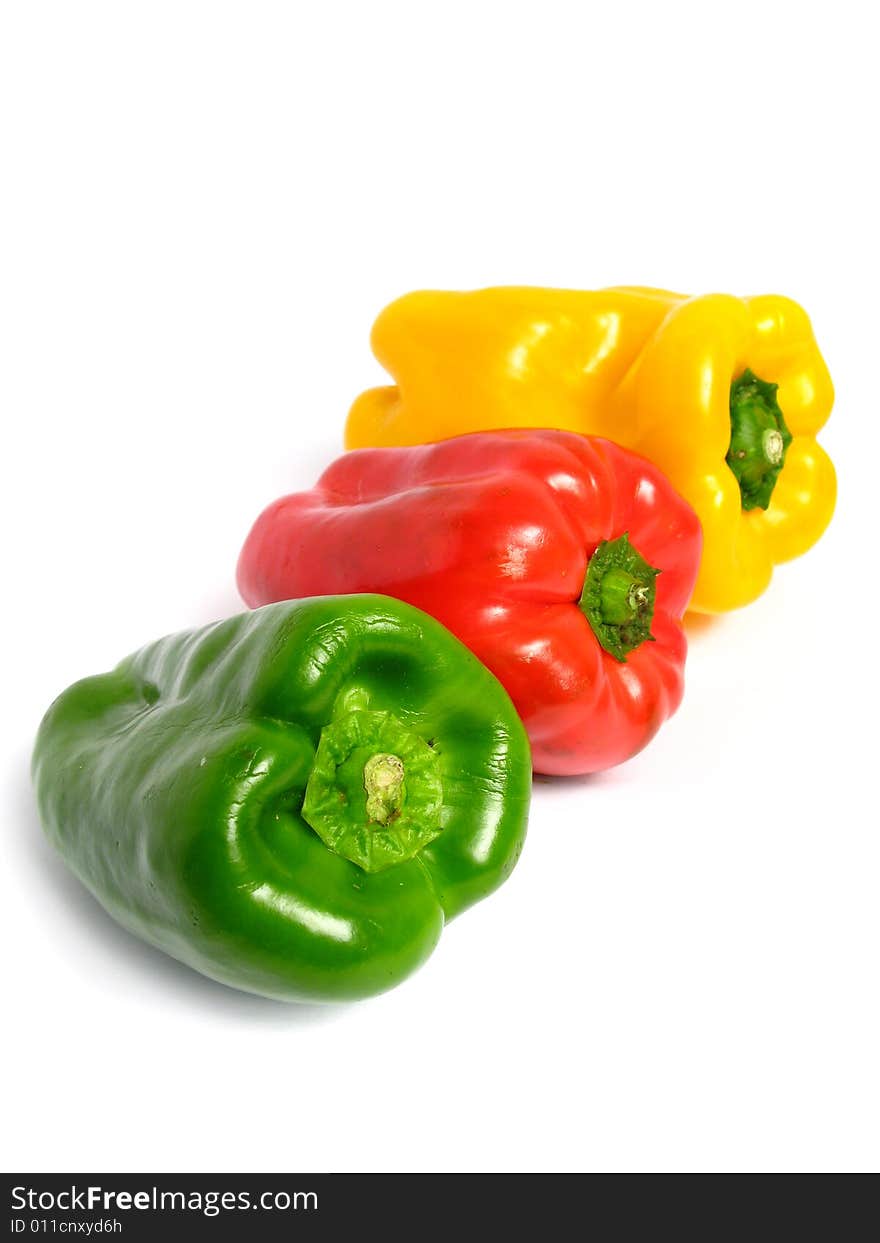 Three color peppers, on white background