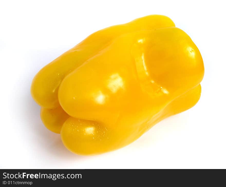 Yellow pepper wet on white background