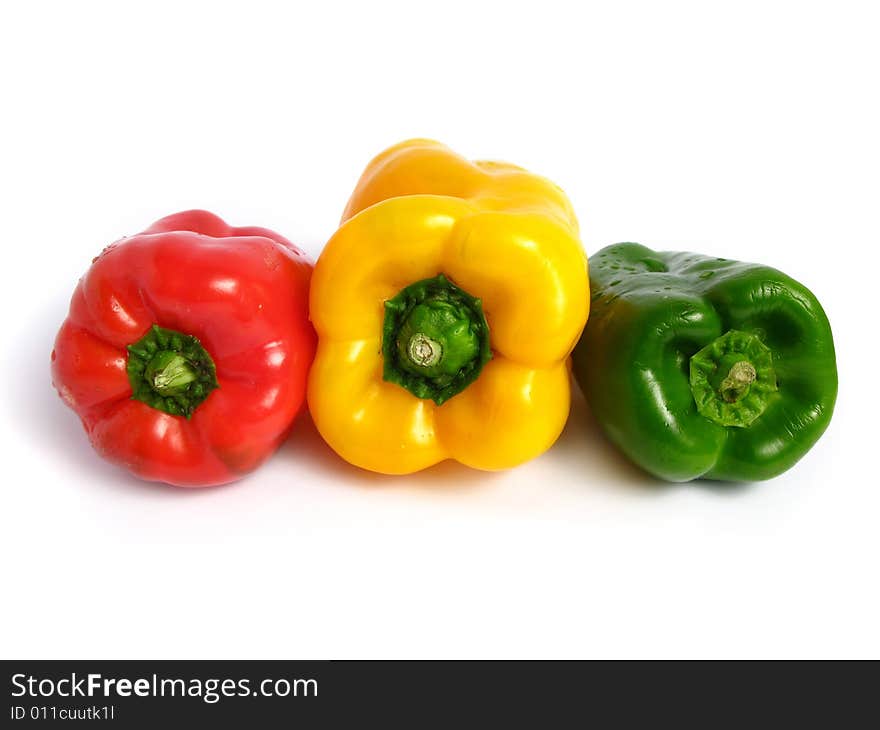 Three color peppers, on white background