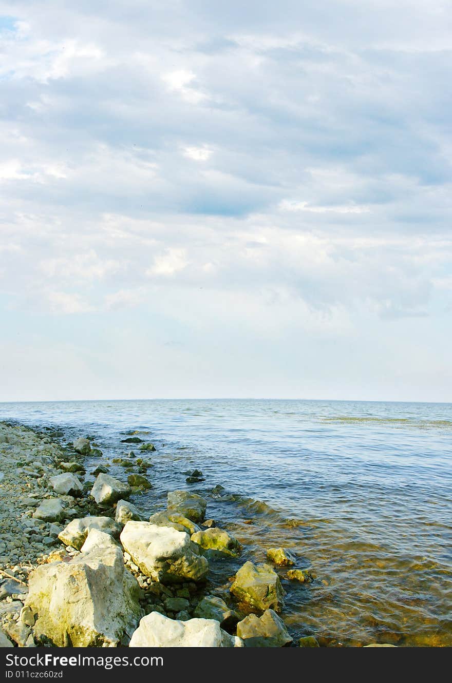 Wave on sea under year blue sky and cloud