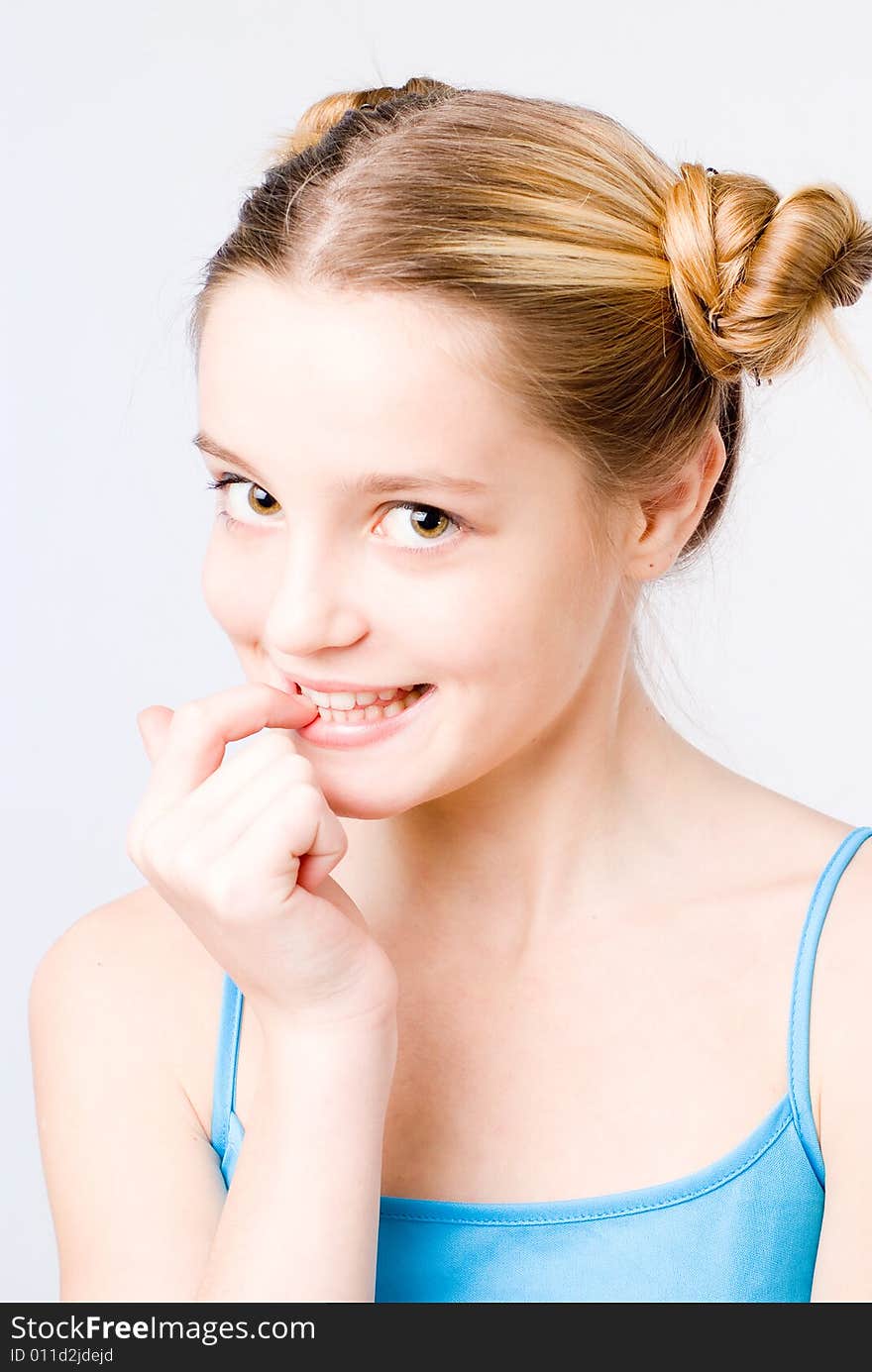 Sprightly pretty girl portraut at white background. Sprightly pretty girl portraut at white background