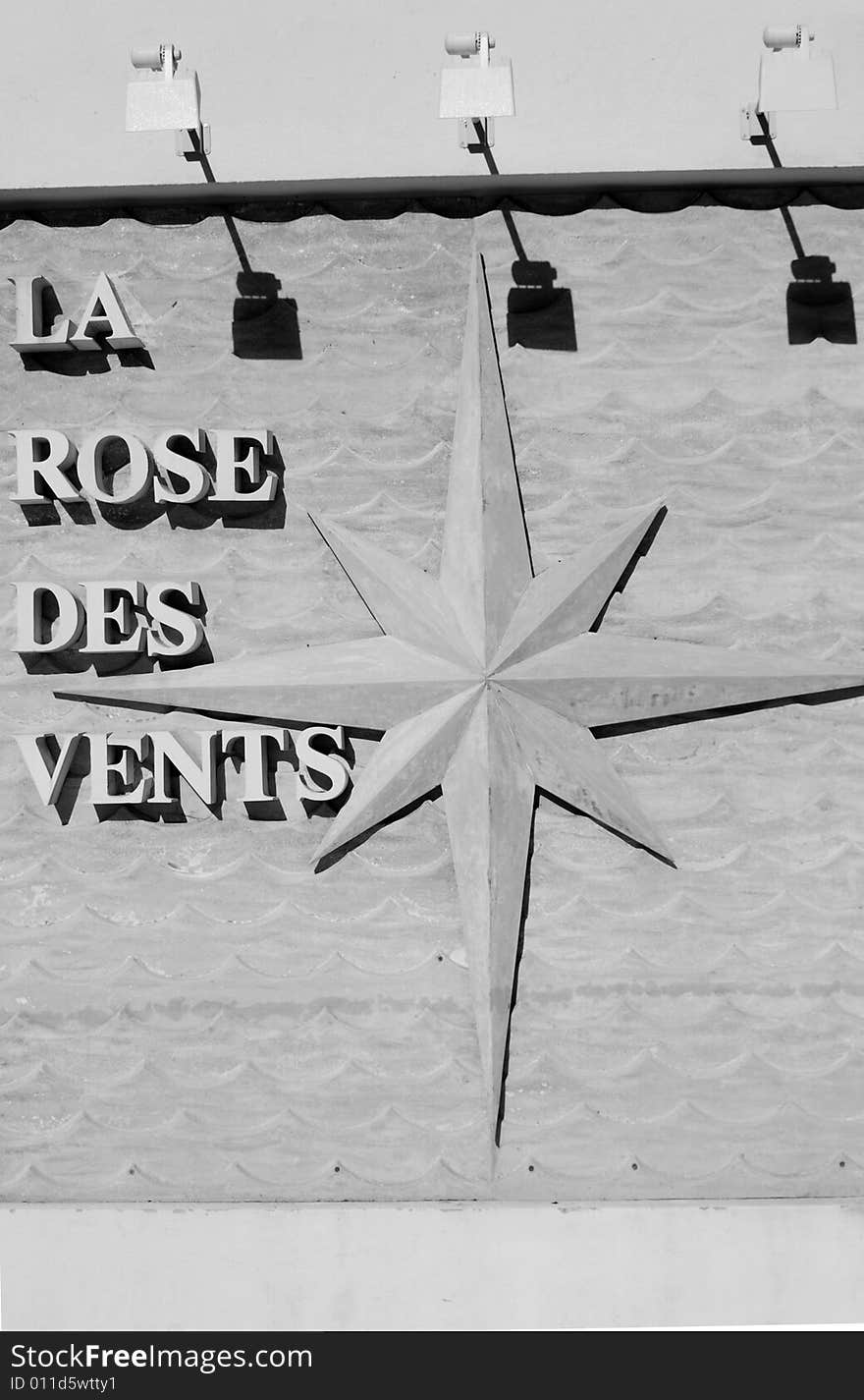 A nice wind rose on a promenade in Montecarlo, b&w