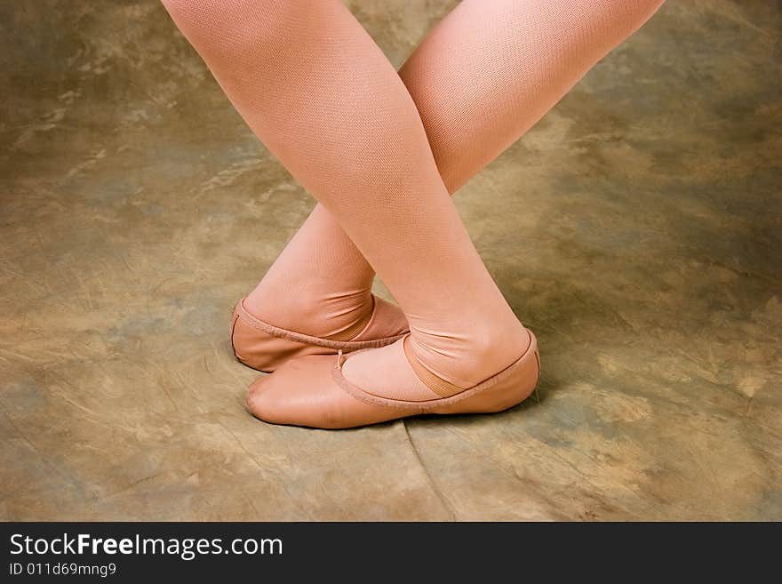 Ballet dancer's flexible legs and feet - walking left and right at the same time. Ballet dancer's flexible legs and feet - walking left and right at the same time