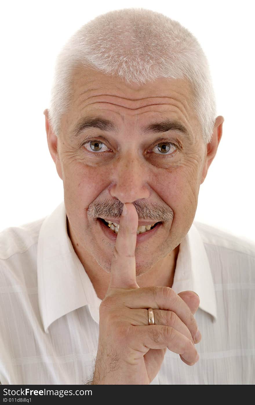 Senior man with silence gesture