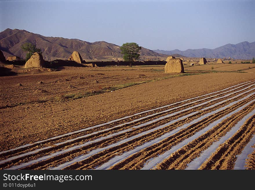 Watchtowers of the great wall and agriculture lands, shanxi province, china