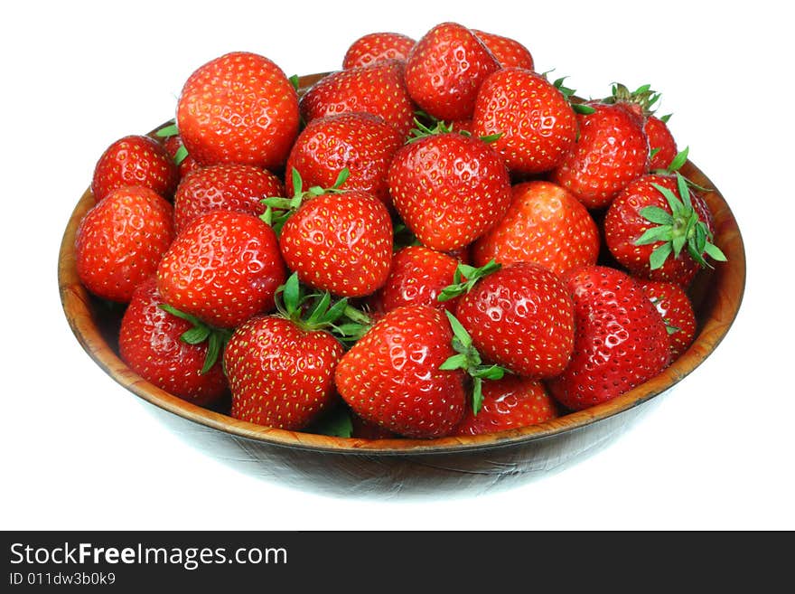 Bowl of strawberries isolated on a white background. Bowl of strawberries isolated on a white background.