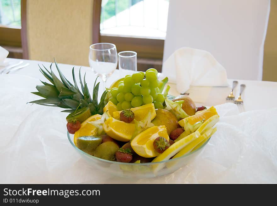 Fruits ob banquet table by presidential chair. Fruits ob banquet table by presidential chair