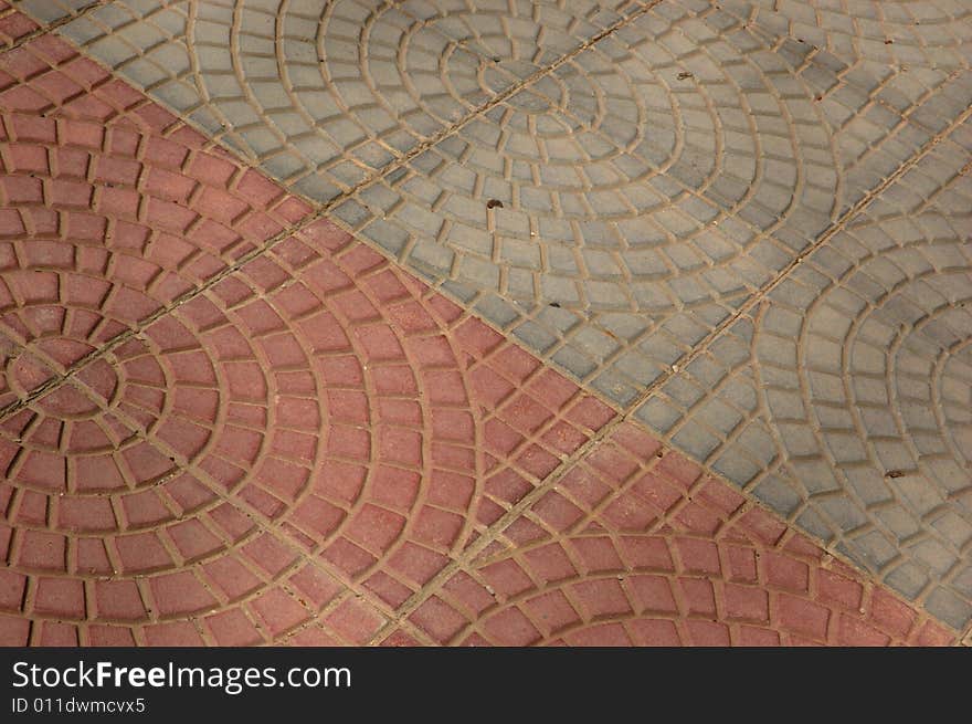 Close-up of new old-style pavement of stoneblocks (bricks) of red color