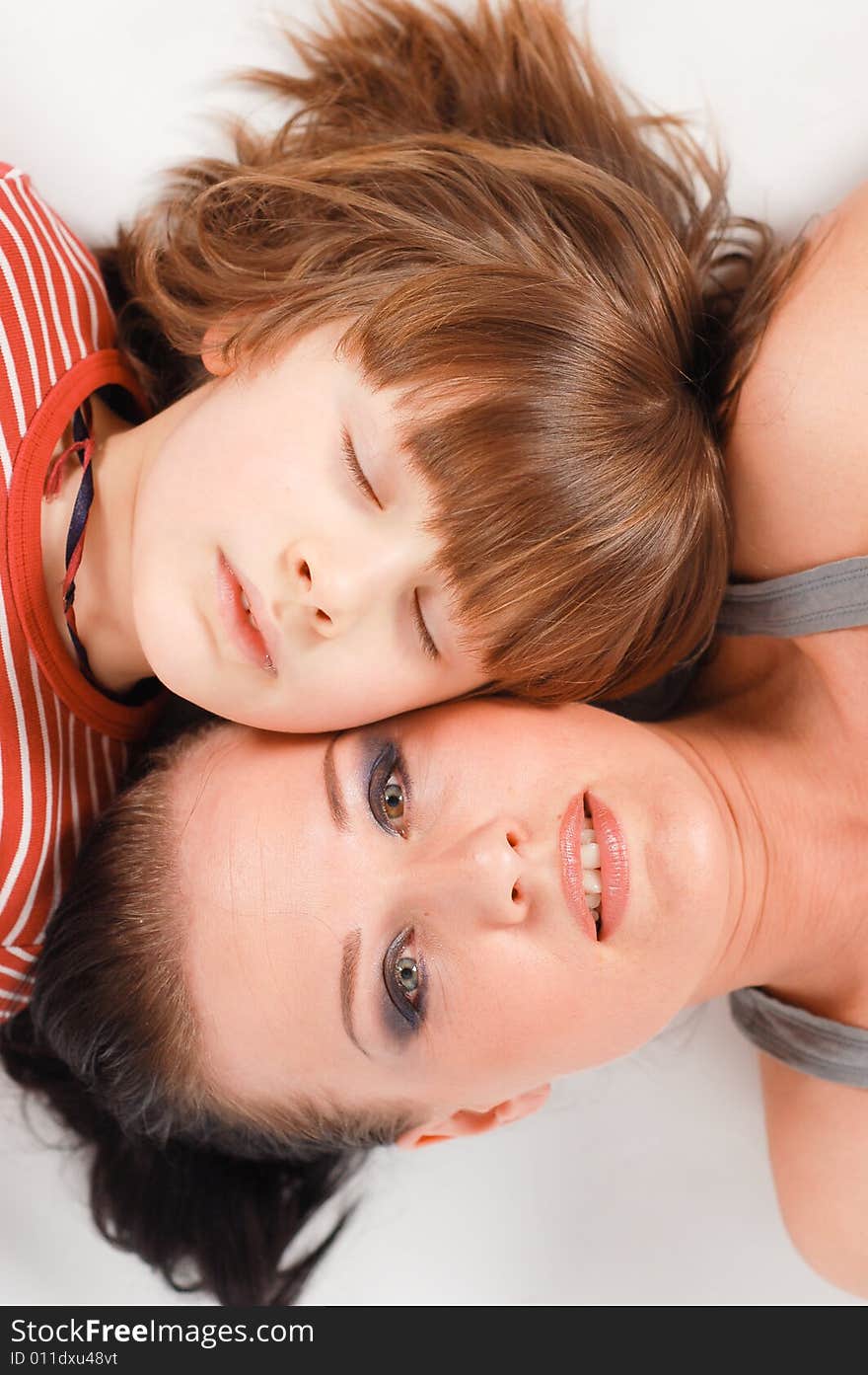 Happy family lying on floor. Happy family lying on floor