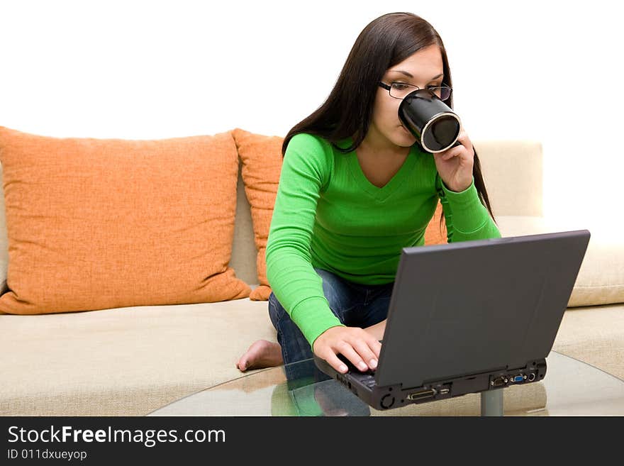 Attractive brunette woman on sofa. Attractive brunette woman on sofa