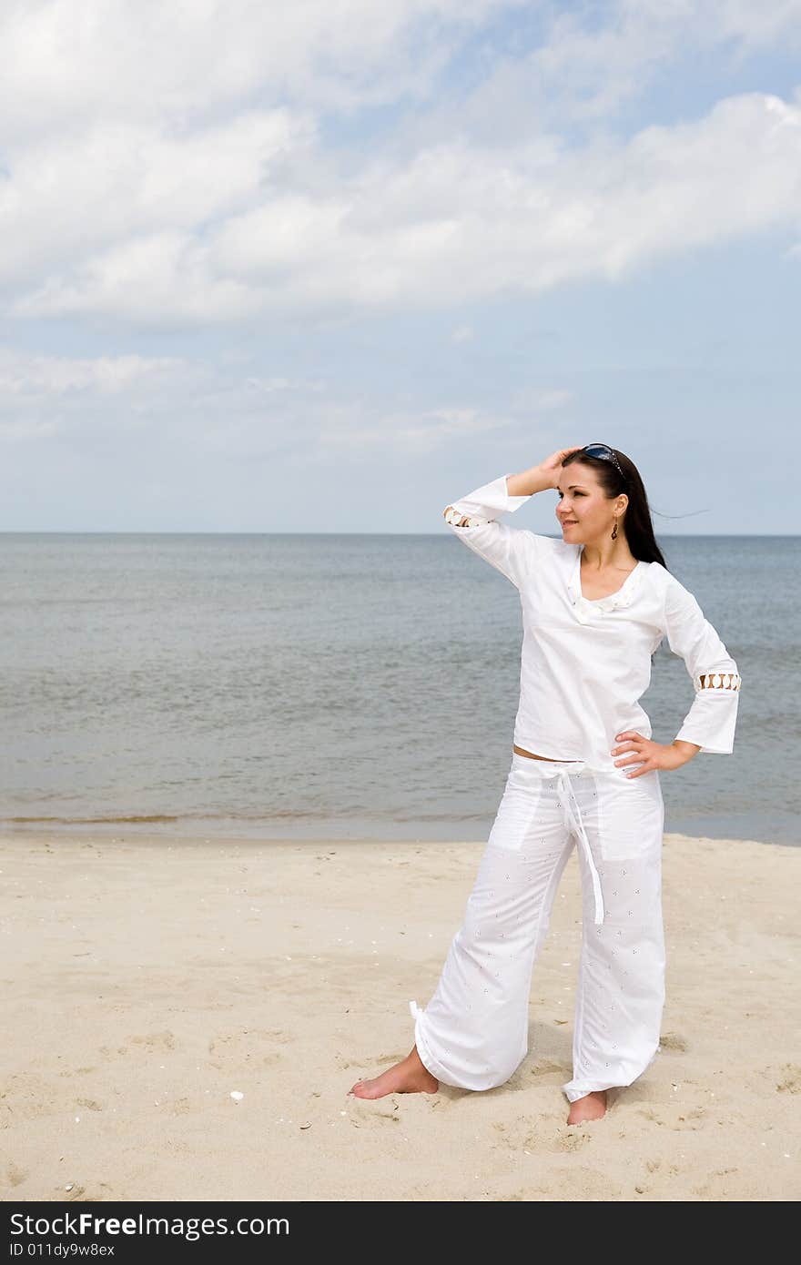 Beauty woman relaxing on the beach. Beauty woman relaxing on the beach