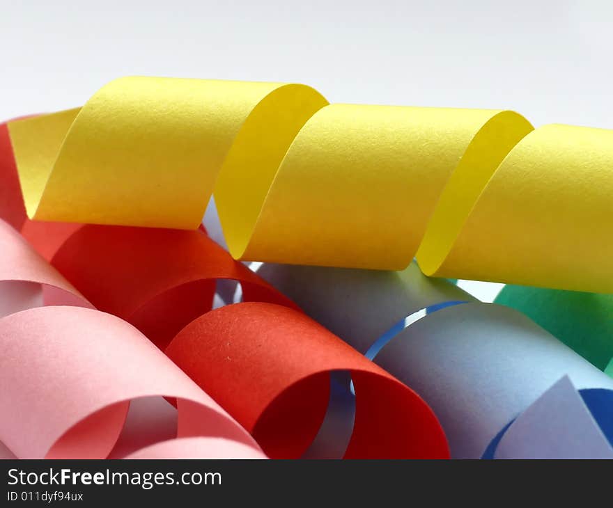 Colorful paper springs on white