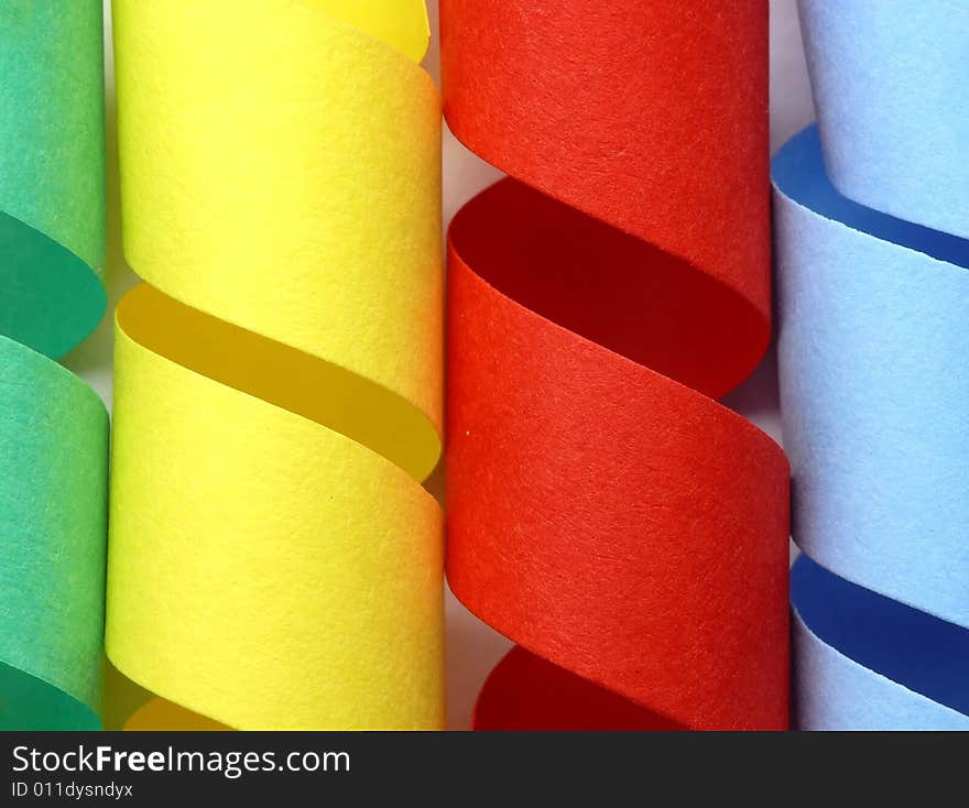 Colorful paper springs on white