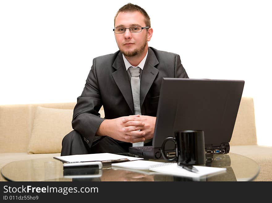 Happy man on sofa with laptop. Happy man on sofa with laptop