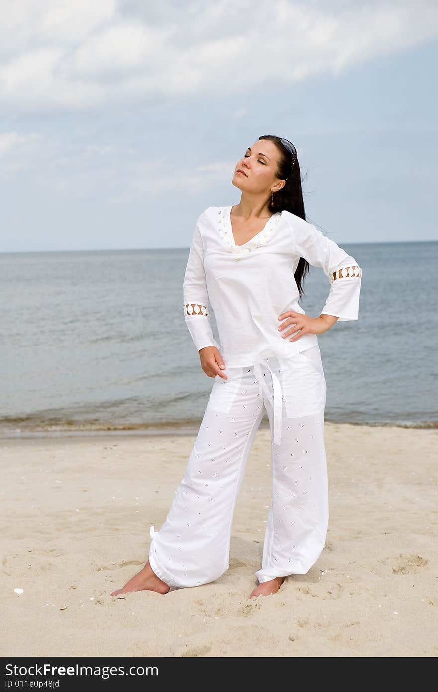 Beauty woman relaxing on the beach. Beauty woman relaxing on the beach