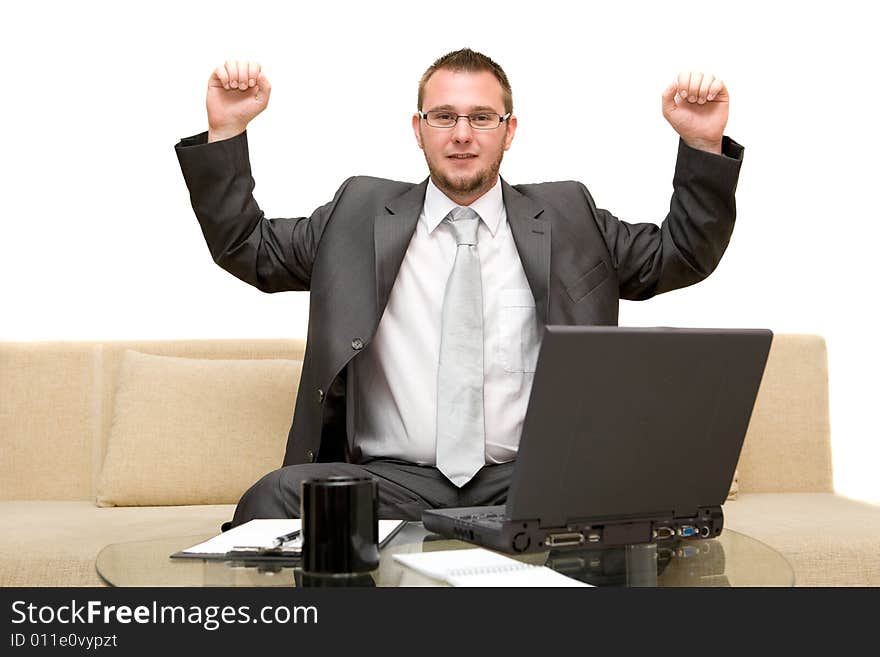 Happy man on sofa with laptop. Happy man on sofa with laptop