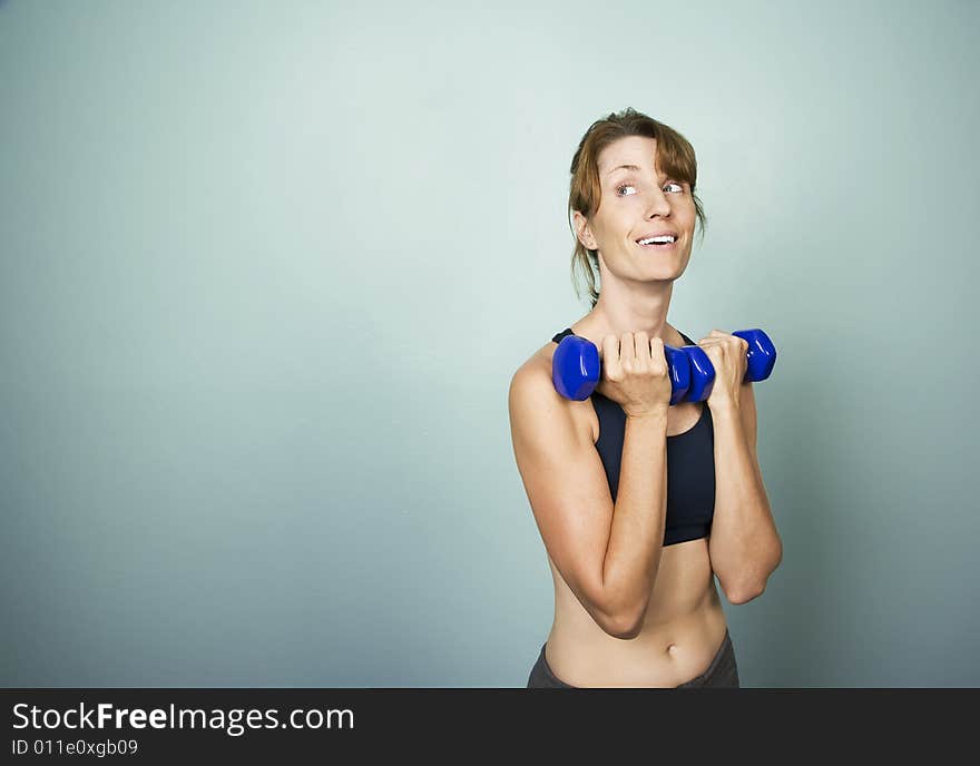 Woman With Dumbbells