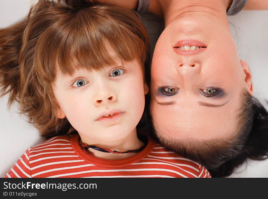 Happy family lying on floor. Happy family lying on floor