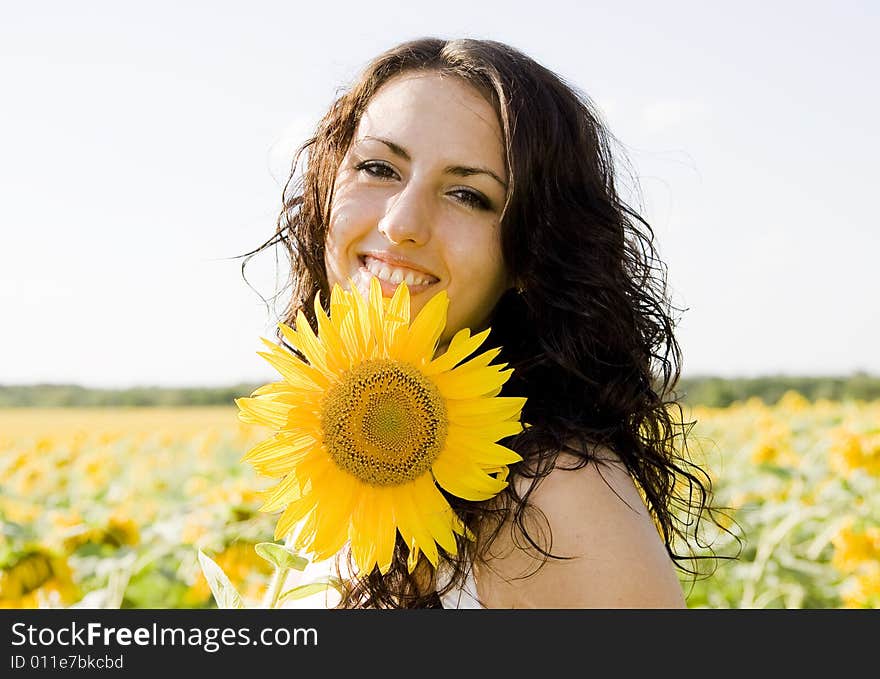 Portrait of girl with sunflower