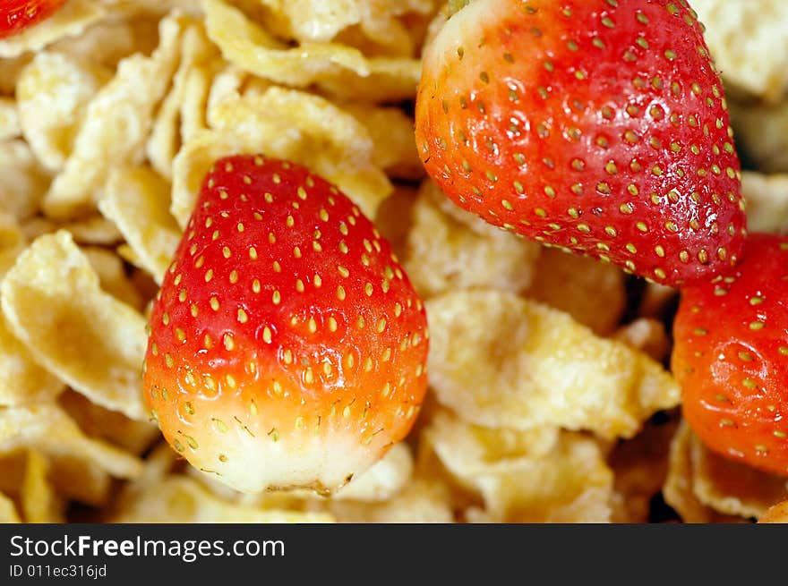 Macro shot of a cereal bowl with strawberries. Macro shot of a cereal bowl with strawberries