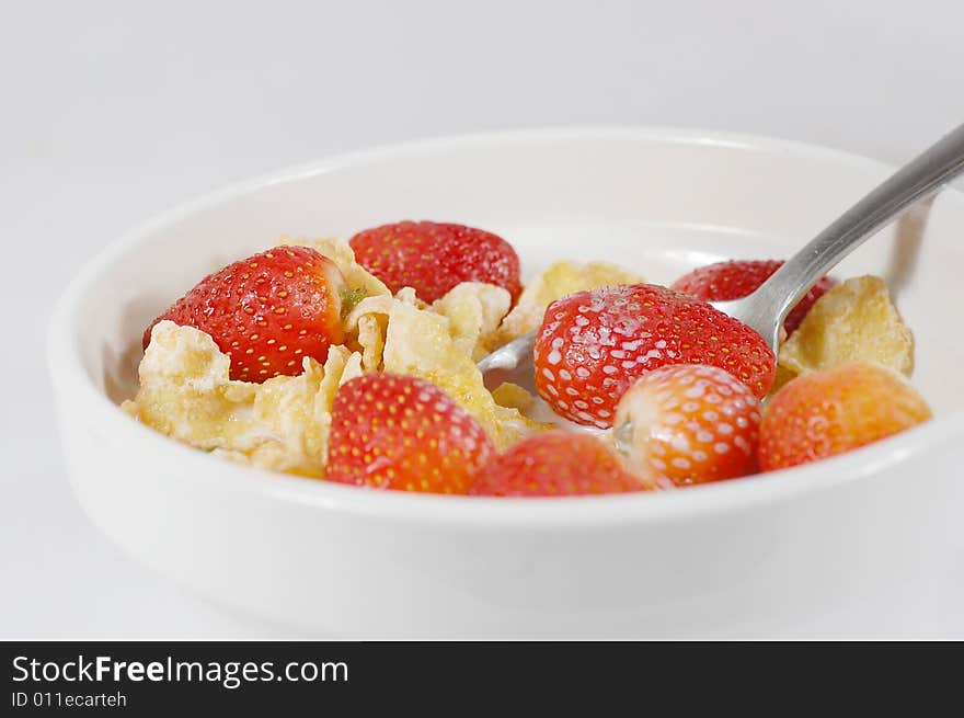 Macro shot of a cereal bowl with strawberries. Macro shot of a cereal bowl with strawberries