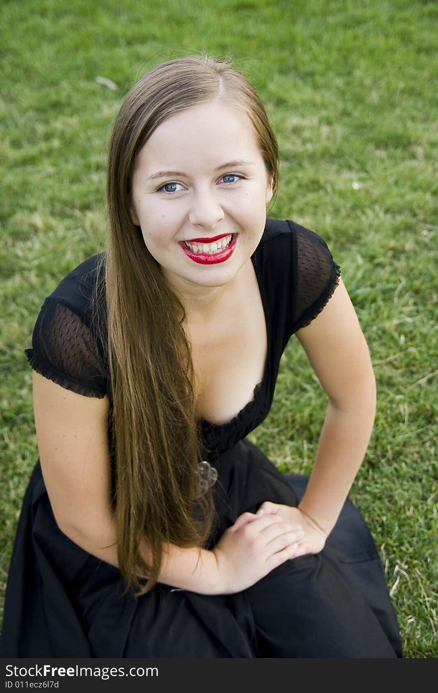 Beautiful smiling girl with red lips