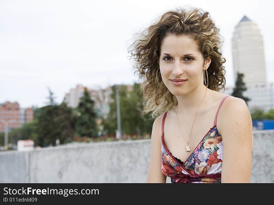 Portrait of smiling girl in city