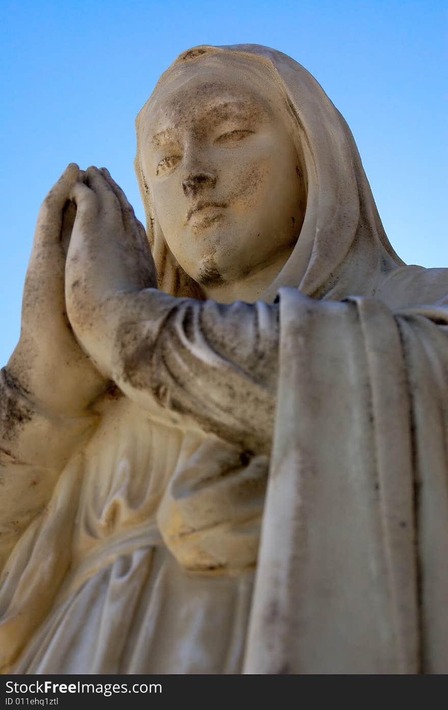 An image of a close-up shot of the Virgin Mary statue.