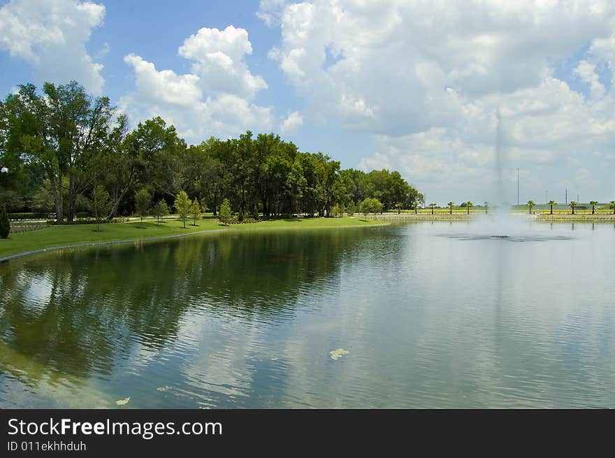 Fountain in a retention pond at a business park. Fountain in a retention pond at a business park.