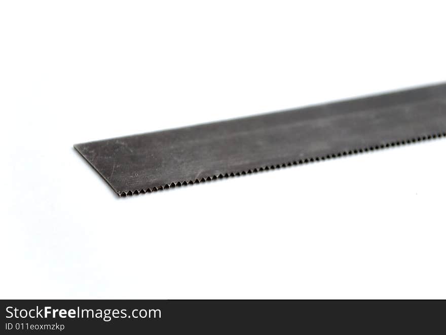 Steel saw on white background