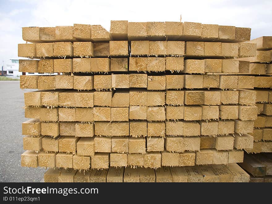 A pile of wood, beam, stapled ready for transport. Picture was taken at the harbour of Antwerp, Belgium.
Nikon D-80, tripod, cloudy light