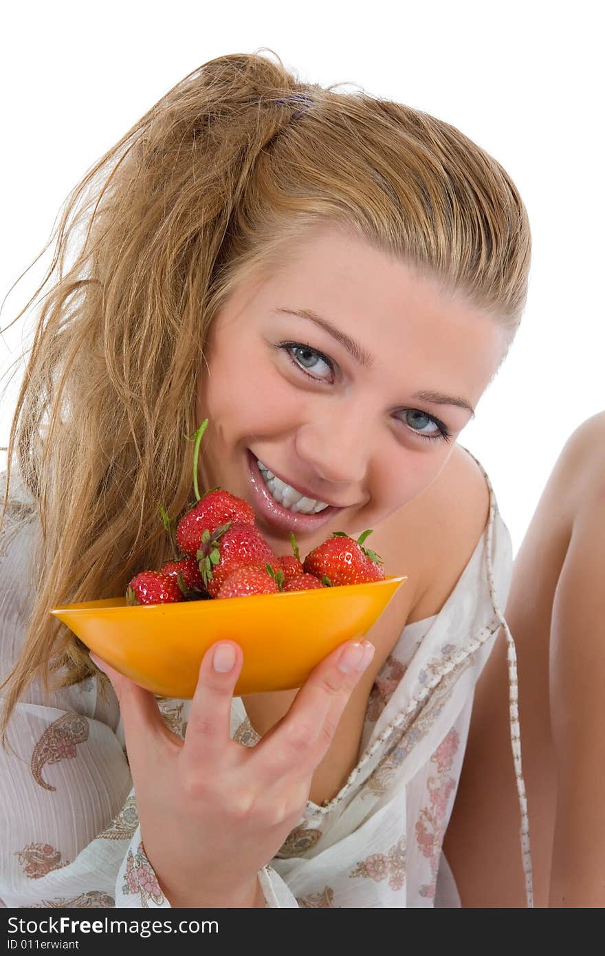 Beautiful girl with strawberry over white