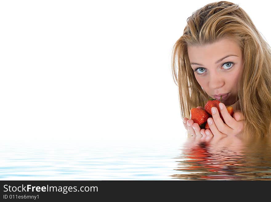 Beautiful girl with strawberry over white