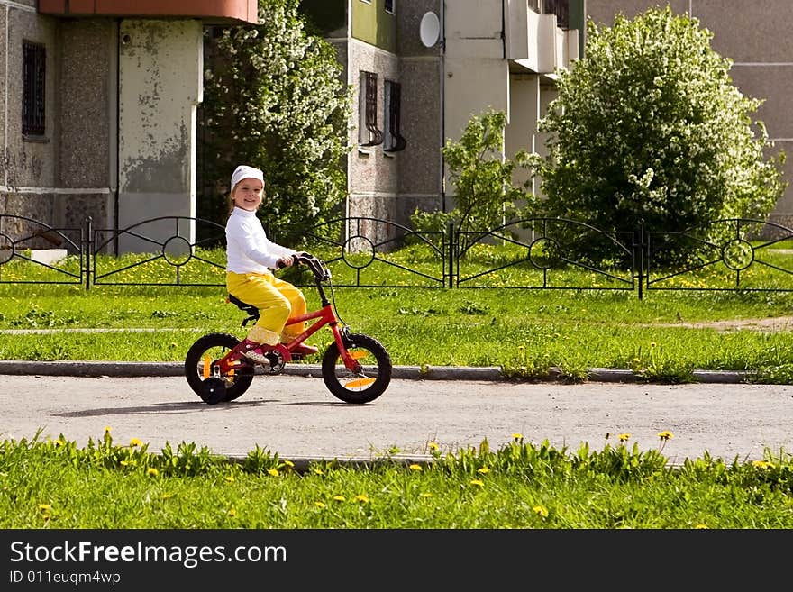 Picture of my daughter going for a drive a bicycle. Picture of my daughter going for a drive a bicycle