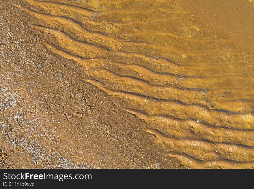 Water on a background of yellow