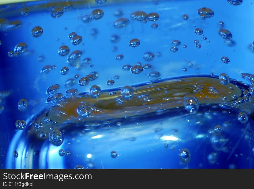 Blue water with bubbles high resolution image