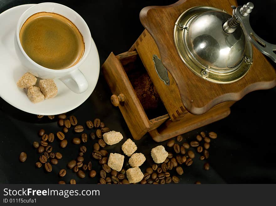 Nostalgic coffee mill and coffee cup