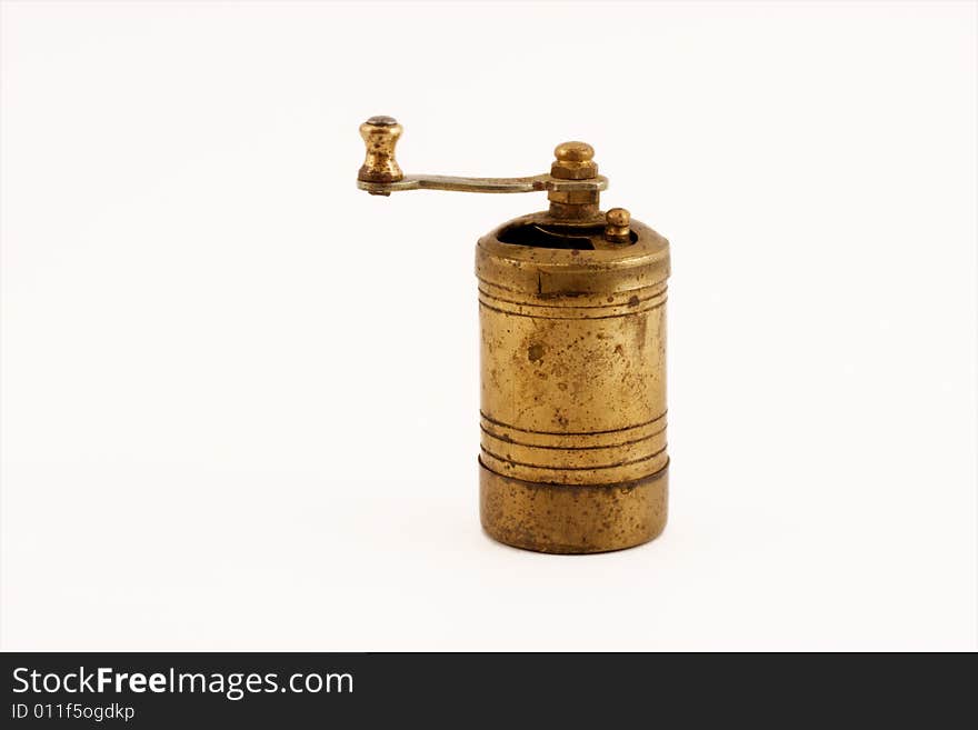 Old bronze pepper-mill with rust. Old bronze pepper-mill with rust