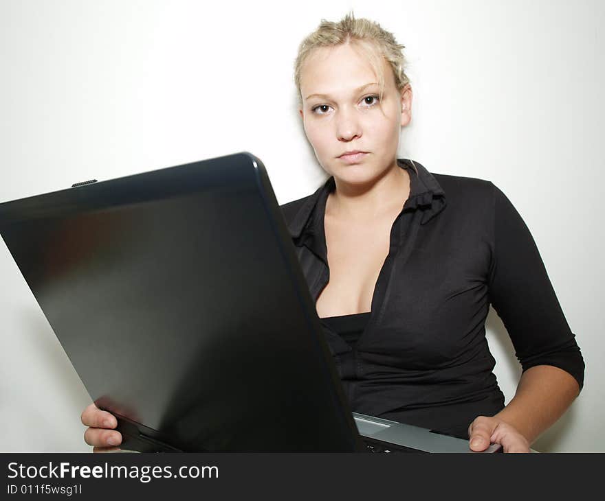 Beautiful girl with black laptop. Beautiful girl with black laptop