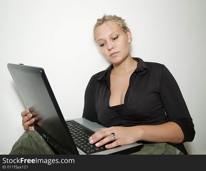 Beautiful girl with black laptop. Beautiful girl with black laptop