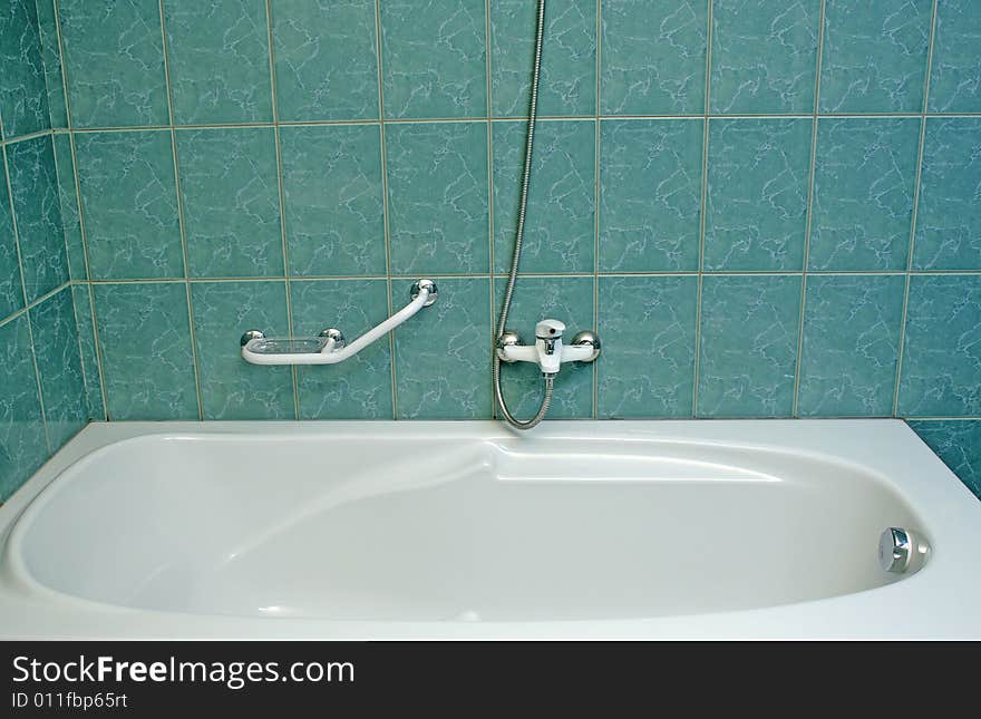 Modern bathroom detail with green tiles. Modern bathroom detail with green tiles