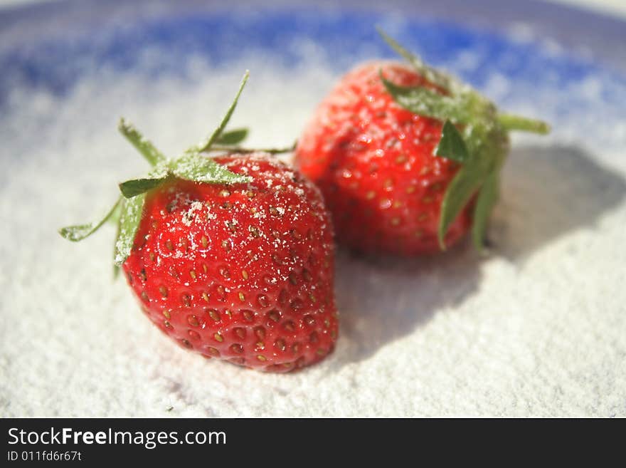 Strawberries on a blue plate