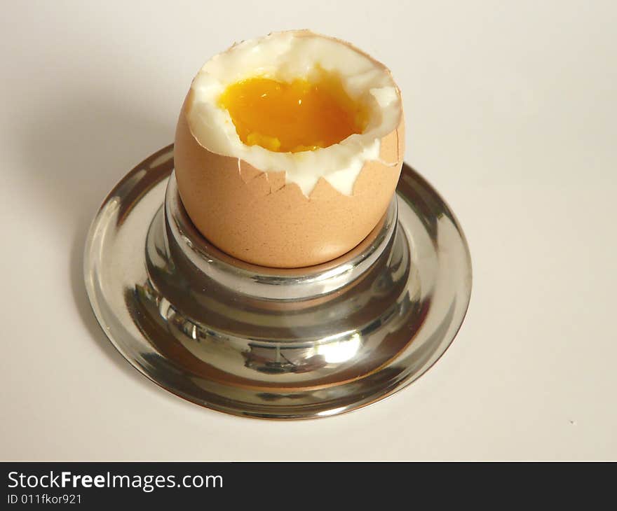 A close up of a Breakfast-egg over white