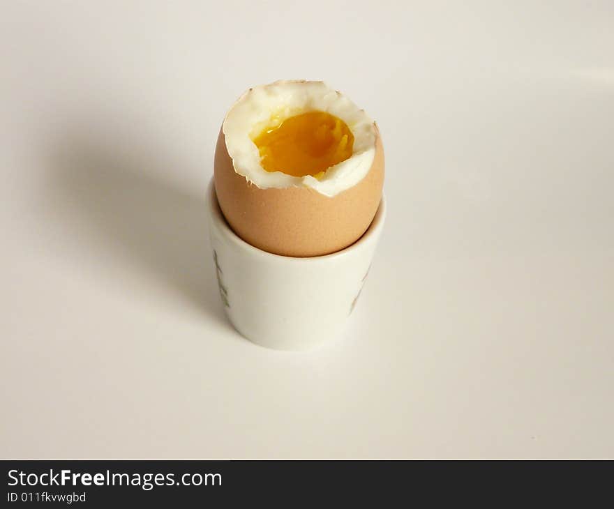 A close up of a Breakfast-egg over white