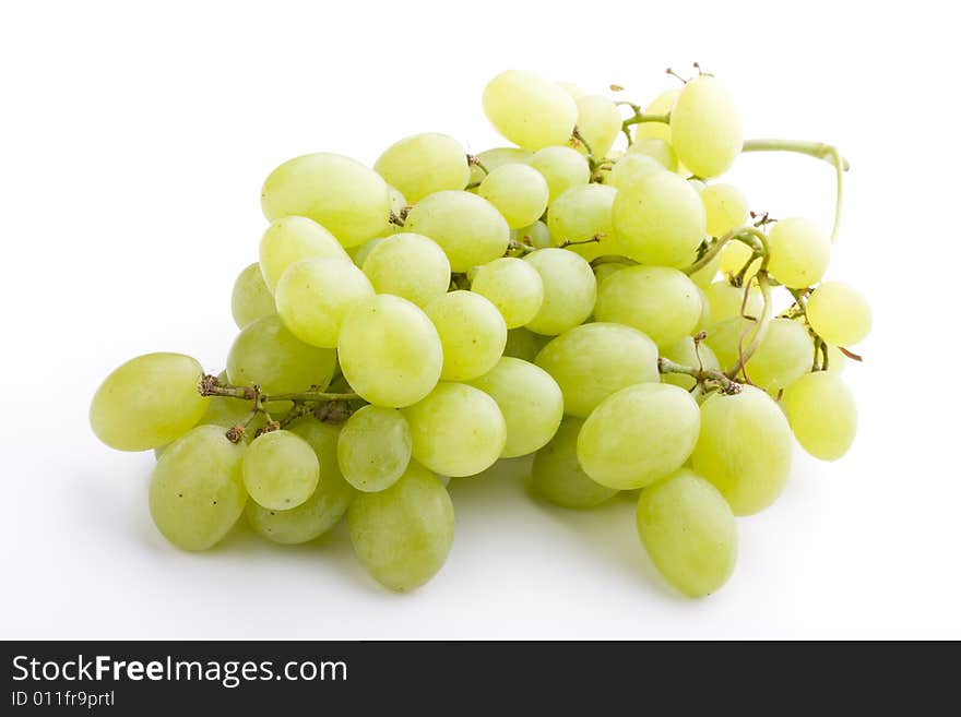 Green grapes on white background