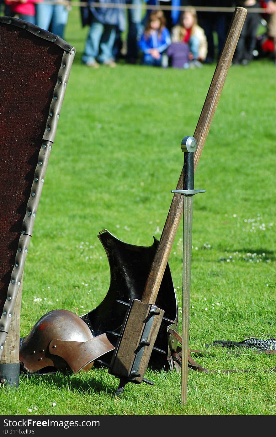 Different weapons lying on a grass. Different weapons lying on a grass