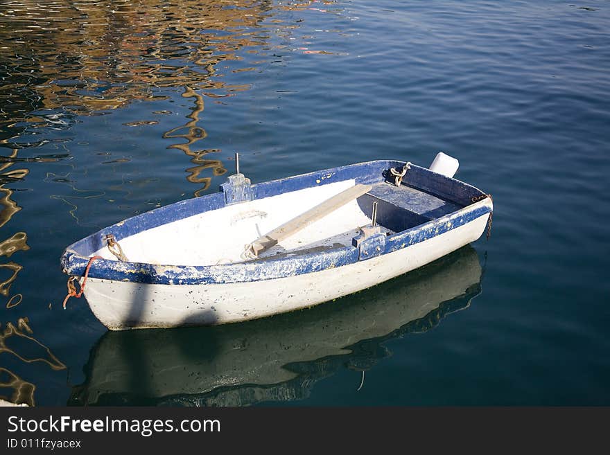 Little boat in a bay